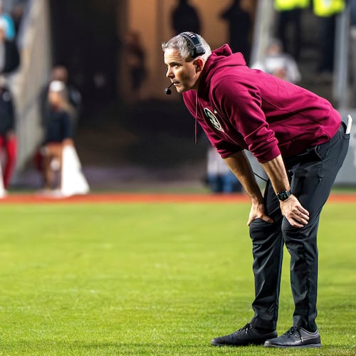 Florida State head coach Mike Norvell stands on the field during the second half of an NCAA college football game against North Carolina State, Friday, Nov. 21, 2025, in Raleigh, N.C. (AP Photo/David Yeazell)