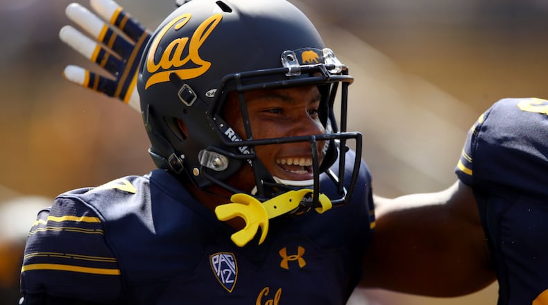 BERKELEY, CA - SEPTEMBER 09: Demetris Robertson #8 of the California Golden Bears smiles after scoring a touchdown against the Weber State Wildcats at California Memorial Stadium on September 9, 2017 in Berkeley, California. (Photo by Ezra Shaw/Getty Images)