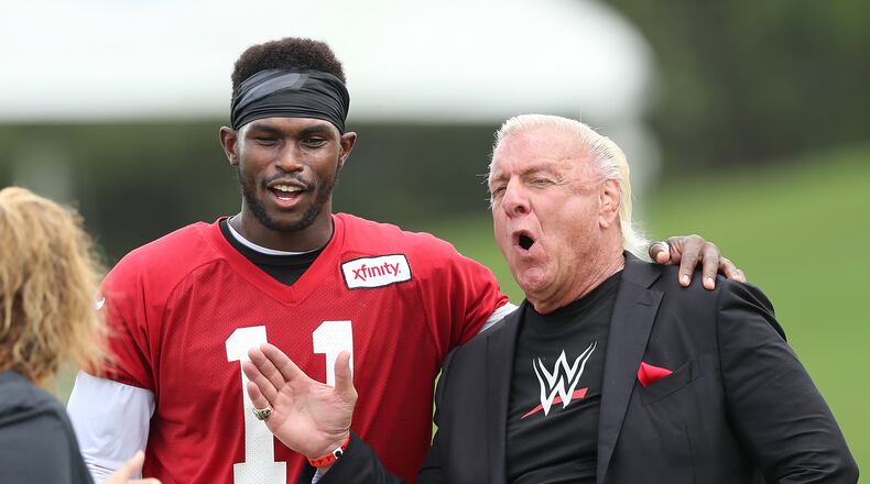 Ric Flair “The Nature Boy”, former professional wrestler, hangs out with Falcons wide receiver Julio Jones during team practice at training camp on Tuesday, August 9, 2016, in Flowery Branch. Curtis Compton /ccompton@ajc.com