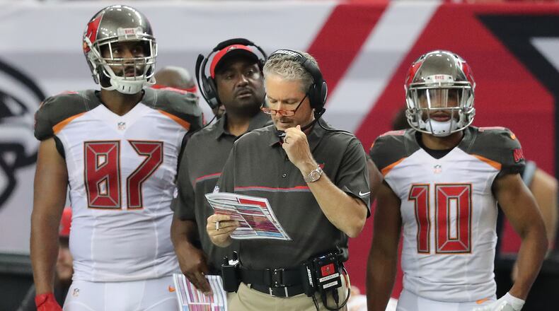 Tampa Bay Buccaneers coach Dirk Koetter apologized Thursday for a team tweet that mocked the Falcons' blown lead in February's Super Bowl. Curtis Compton /ccompton@ajc.com