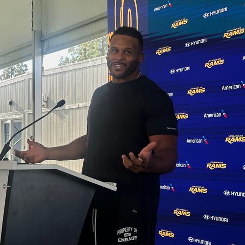 Aaron Donald speaks to the media at the Los Angeles Rams' training complex in Los Angeles, Sunday, Aug. 30, 2026. (AP Photo/Greg Beacham)