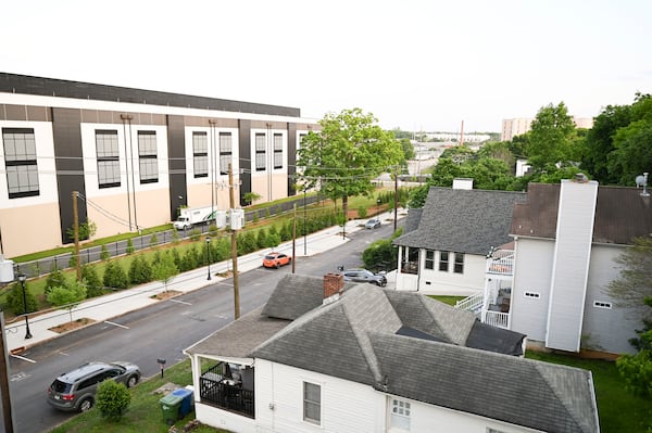 The QTS Data Center is seen in the background of the Howell Station neighborhood on April 30, 2025, in Atlanta. (Daniel Varnado for The Atlanta Journal-Constitution)