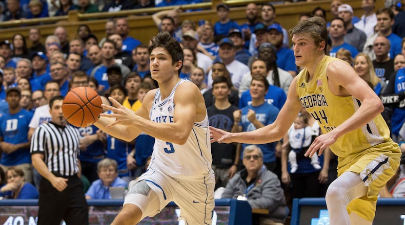 Duke’s Grayson Allen (3) drives against Georgia Tech’s Ben Lammers (44) during the first half of an NCAA college basketball game in Durham, N.C., Wednesday, Jan. 4, 2017. (AP Photo/Ben McKeown)