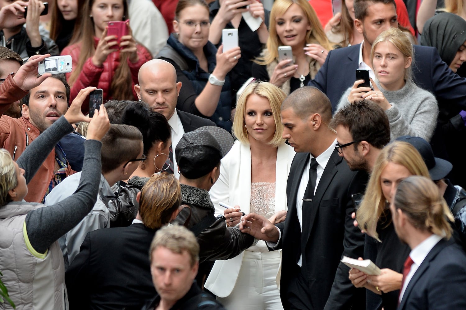 Pop star unveils styles in Germany, New York