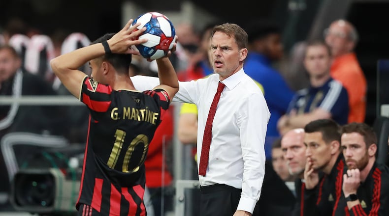 March 10, 2019 Atlanta: Atlanta United head coach Frank de Boer directs midfielder Pity Martinez against FC Cincinnati in their MLS soccer match on Sunday, March 10, 2019, in Atlanta. Curtis Compton/ccompton@ajc.com