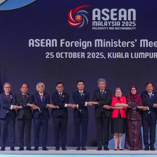 From left to right, Lao's Minister of Foreign Affairs Thongsavanh Phomvihane, Myanmar's Permanent Secretary of the Ministry of Foreign Affairs U Hau Khan Sum, Singapore's Permanent Secretary of Foreign Affairs Albert Chu, Thailand's Foreign Minister Sihasak Phuangketkeow, Vietnam's Deputy Minister of Foreign Affairs Dang Hoang Giang, Malaysia's Foreign Minister Mohamad Hasan, Philippine Foreign Secretary Theresa Lazaro, unidentified Brunei's representative, Cambodia's Foreign Minister Prak Sokhonn, Indonesia's Foreign Minister Sugiono, East Timor's Foreign Minister Bendito dos Santos Freitas and ASEAN Secretary-General Kao Kim Hourn pose for a group photo during ASEAN foreign ministers' meeting at the Kuala Lumpur Convention Centre in Kuala Lumpur, Malaysia, Saturday, Oct. 25, 2025. (AP Photo/Rafiq Maqbool)
