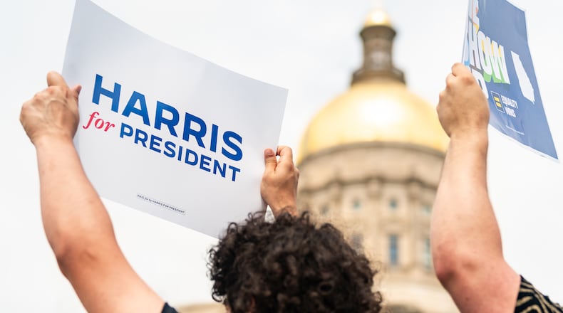 Young Democrats of Georgia member Royce Mann of Atlanta holds a sign in support of Vice President Kamala Harris’ presidential campaign during a press conference at Liberty Plaza near the Georgia State Capitol in Atlanta on Wednesday, July 24, 2024. Harris is holding a rally in Savannah Thursday. (Seeger Gray / AJC)