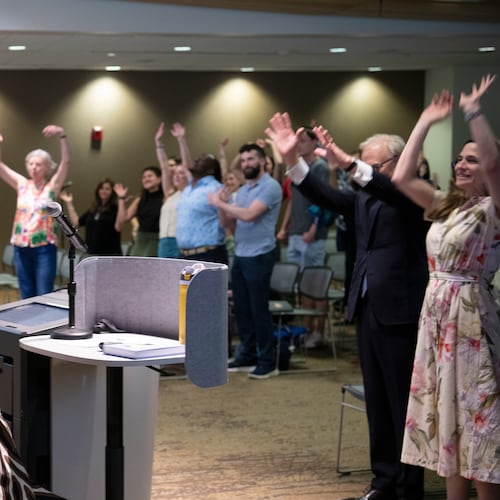 Katharine Wilkinson gives a talk about living with climate uncertainty at American University in Washington on April 14, 2026. (AP Photo/Michael Phillis)