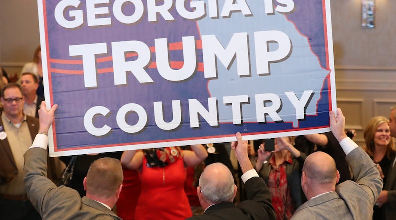 ATLANTA: Republican voters celebrate as it is announced Trump wins Georgia at the Republican Watch party at the Grand Hyatt, Buckhead, on Tuesday, Nov. 7, 2016, in Atlanta. Curtis Compton /ccompton@ajc.com