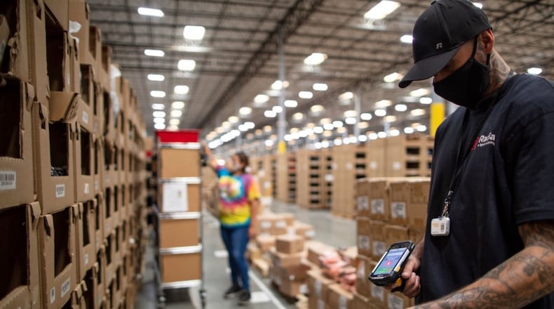 Employees at one of Radial's fulfillment centers. The company is hiring more than 500 to help with seasonal demands. (Courtesy Radial)