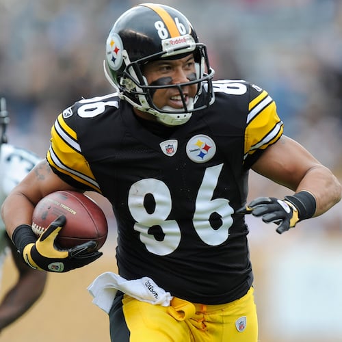 In this Sunday, Oct. 16, 2011, file photo, Pittsburgh Steelers wide receiver Hines Ward (86) runs past Jacksonville Jaguars defensive back Drew Coleman (30) after making a catch in the second quarter of an NFL football game in Pittsburgh. Ward's 12,083 receiving yards are the most in NFL history by a former Georgia high school player. Ward was a multi-posiiton player at Forest Park in the 1990s. (Don Wright/AP File)
