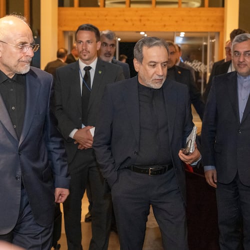Iranian Foreign Minister Seyyed Abbas Araghchi, center, and Speaker of the Islamic Parliament of Iran Mohammed Bagher Ghalibaf, left, arrive at the Buergenstock resort in Obbuergen, near Lucerne, Switzerland, early Sunday, June 21, 2026. (Urs Flueeler/Keystone, Pool via AP)