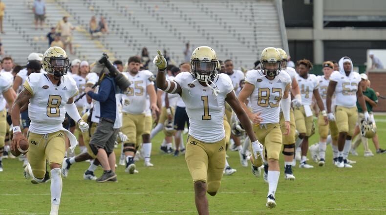 September 29, 2018 Atlanta - Georgia Tech football players celebrate after Georgia Tech won 63-17 over the Bowling Green at Bobby Dodd Stadium on Saturday, September 29, 2018. HYOSUB SHIN / HSHIN@AJC.COM