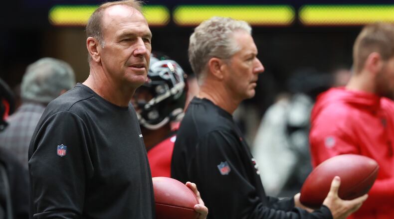 tlanta Falcons tight ends coach Mike Mularkey (left) and offensive coordinator Dirk Koetter (right) prepare the team to play the Los Angeles Rams in an NFL football game on Sunday, October 20, 2019, in Atlanta.    Curtis Compton/ccompton@ajc.com