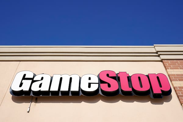 FILE - In this file photo, a GameStop sign is displayed above a store in Urbandale, Iowa, on Jan. 28, 2021. (AP Photo/Charlie Neibergall, File)