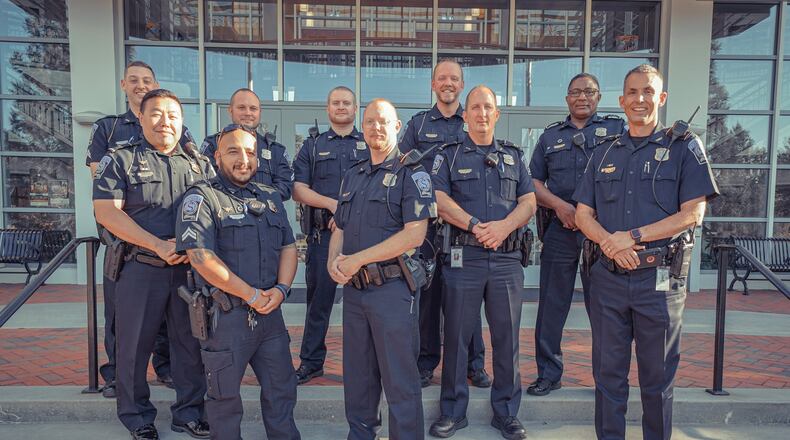 Now through Nov. 12, the Duluth Police Department and Suwanee Police Department (shown here) are competing to see which can collect the most canned food for needy families. (Courtesy City of Suwanee)