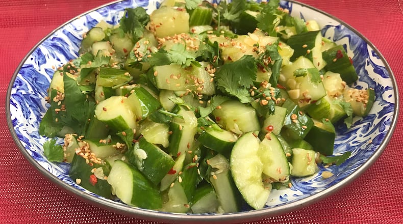 Smashed cucumber salad. LIGAYA FIGUERAS / LIGAYA.FIGUERAS@AJC.COM