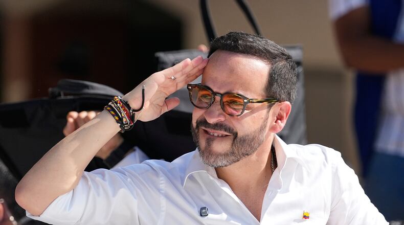 Presidential candidate Abelardo de la Espriella of the Defenders of the Motherland movement salutes after voting during the presidential election in Barranquilla, Colombia, Sunday, May 31, 2026. (AP Photo/Fernando Vergara)