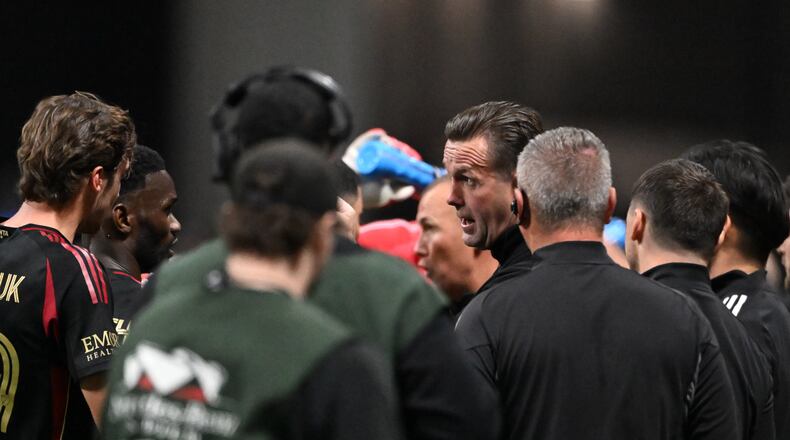 Atlanta United head coach Ronny Deila (center) instructs during  Atlanta United’s MLS season opener at Mercedes-Benz Stadium, Saturday, February 22, 2025, in Atlanta. Atlanta United won 3-2 over CF Montreal. (Hyosub Shin / AJC)