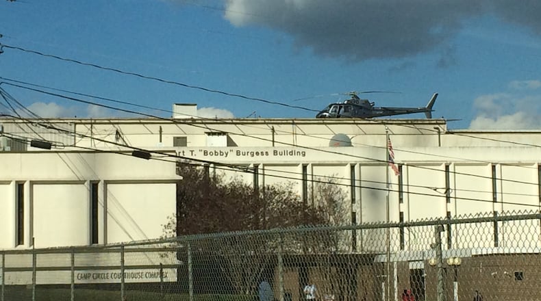 The Robert "Bobby" Burgess Building on Memorial Drive near I-285 turns some heads when a helicopter is perched up top.