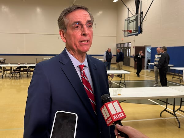 Secretary of State Brad Raffensperger spoke with reporters following his speech to the Roswell Rotary Club on Thursday in Roswell. (Adam Beam/AJC)