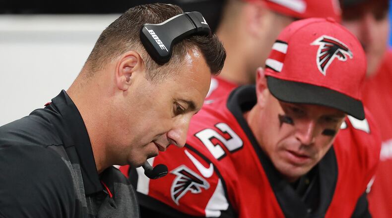 Falcons offensive coordinator Steve Sarkisian and quarterback Matt Ryan confer on the sidelines during the fourth quarter against the New Orleans Saints in an NFL football game on Sunday, Sept 23, 2018, in Atlanta. Curtis Compton/ccompton@ajc.com
