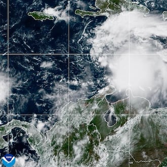 This NOAA satellite image taken at 11:40 a.m. EST on Tuesday, Oct. 21, 2025, shows Tropical Storm Melissa in the Central Caribbean Sea. (NOAA via AP)