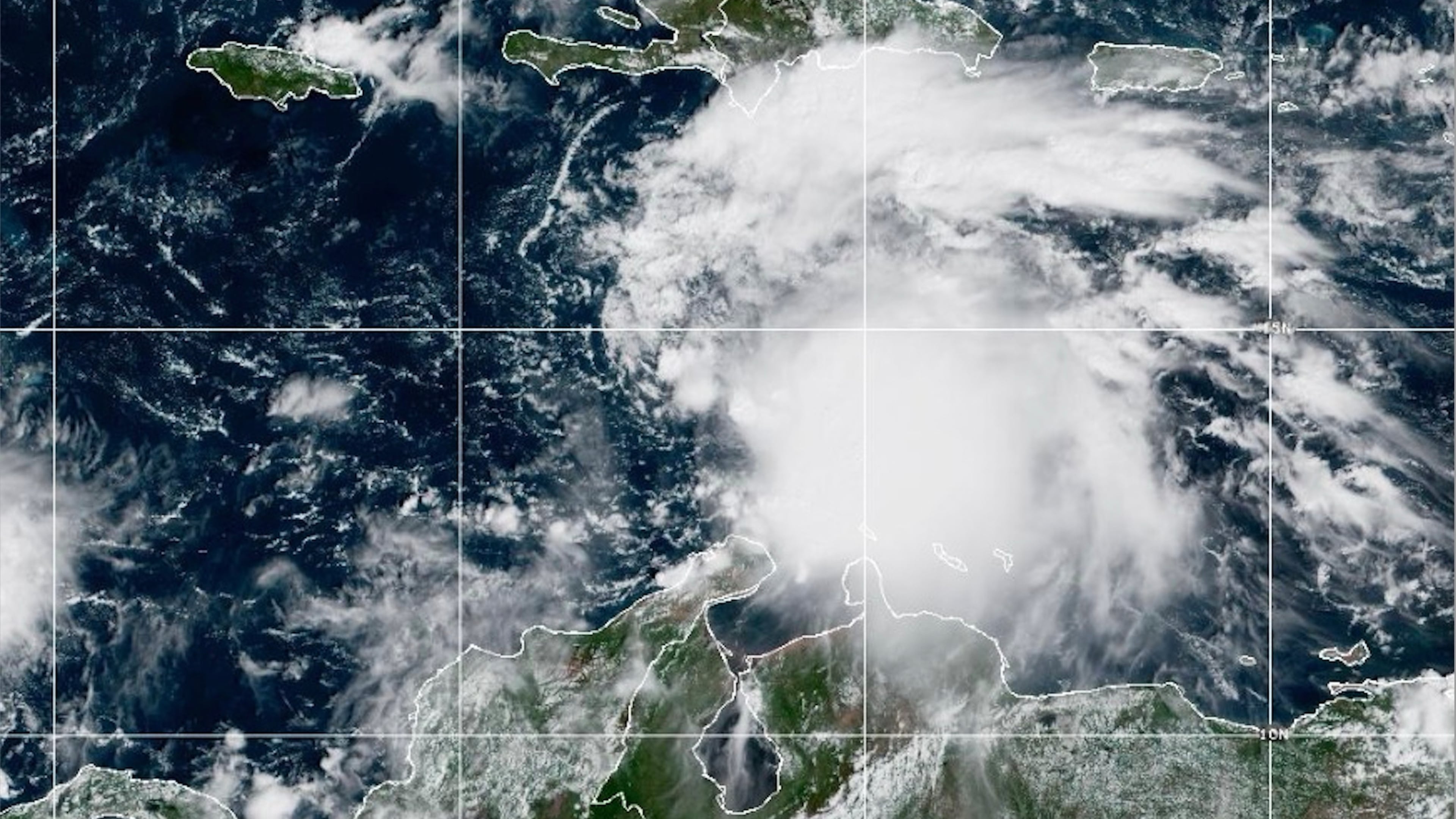 This NOAA satellite image taken at 11:40 a.m. EST on Tuesday, Oct. 21, 2025, shows Tropical Storm Melissa in the Central Caribbean Sea. (NOAA via AP)