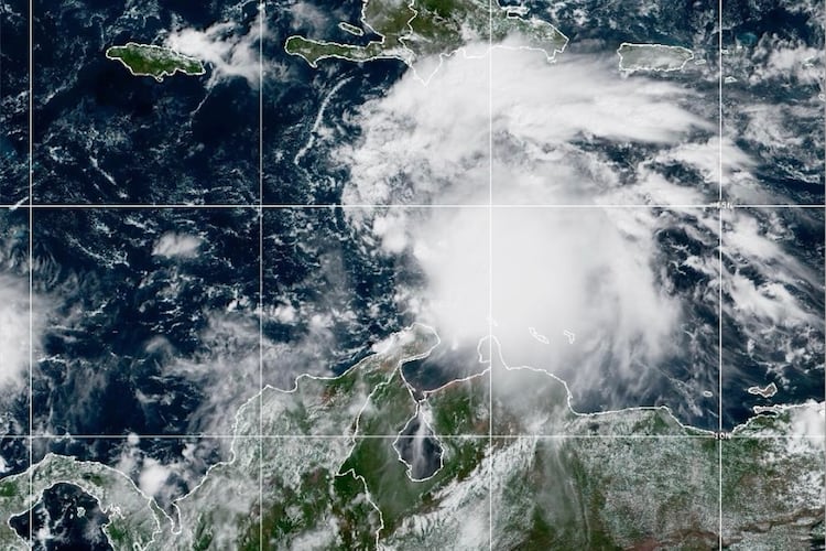 This NOAA satellite image taken at 11:40 a.m. EST on Tuesday, Oct. 21, 2025, shows Tropical Storm Melissa in the Central Caribbean Sea. (NOAA via AP)