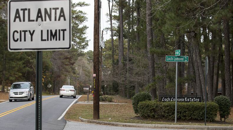 An Atlanta city limit sign is displayed near an entrance to the Loch Lomond Estates neighborhood subdivision in South Fulton. (ALYSSA POINTER/ALYSSA.POINTER@AJC.COM) AJC FILE PHOTO