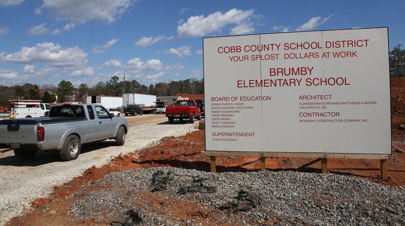 March 10, 2017, Atlanta, Georgia - The sign at the construction site at the intersection of Terrell Mill Road and Greenwood Trail advertises where Cobb county citizen’s SPLOST tax dollars are being put towards in Marietta. (HENRY TAYLOR / HENRY.TAYLOR@AJC.COM)