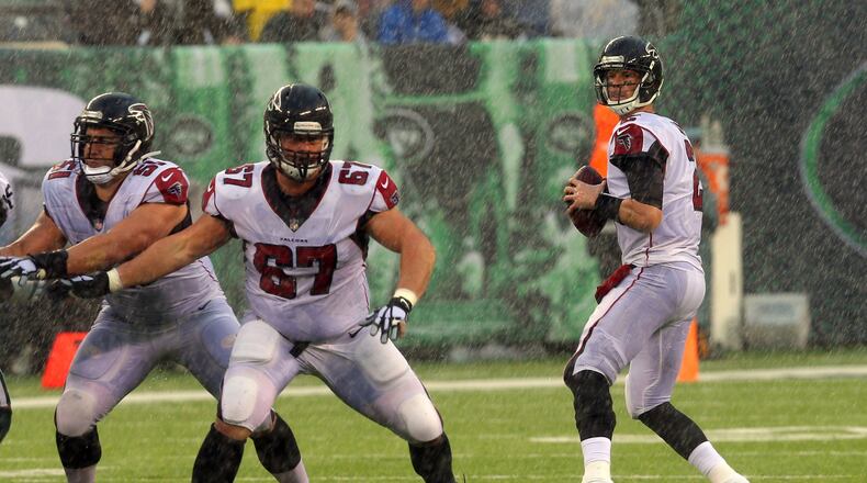 Atlanta Falcons quarterback Matt Ryan (2) drops back to pass against the New York Jets during the second quarter at MetLife Stadium.