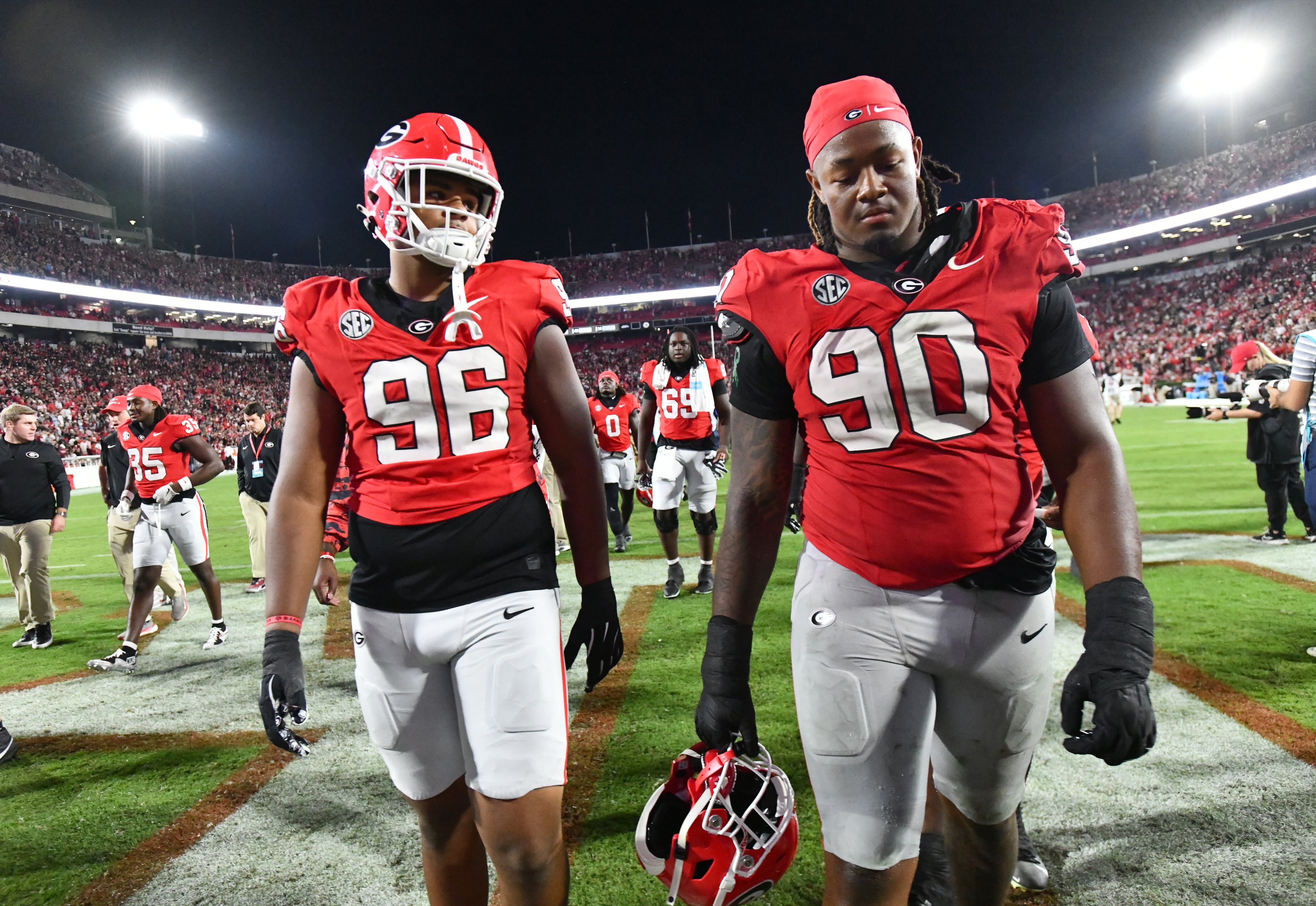 Georgia players leave after Alabama beat Georgia in an NCAA football game at Sanford Stadium, Saturday, September 27, 2025, in Athens. Alabama won 24-21 over Georgia. (Hyosub Shin / AJC)