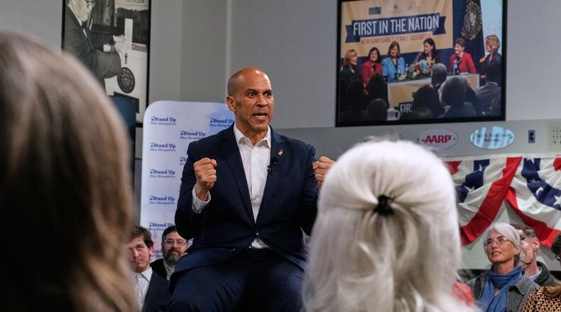 Sen. Cory Booker, D-N.J., addresses a gathering Friday, Nov. 14, 2025, in Manchester, N.H. (AP Photo/Charles Krupa)