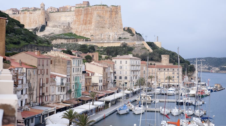 The cliff-top citadel and harbor of Bonifacio, a medieval town on the southern tip of the French island of Corsica, in March, 2016. Corsica is a resilient and dramatically beautiful island that holds itself apart from mainland France. (Susan Wright/The New York Times)