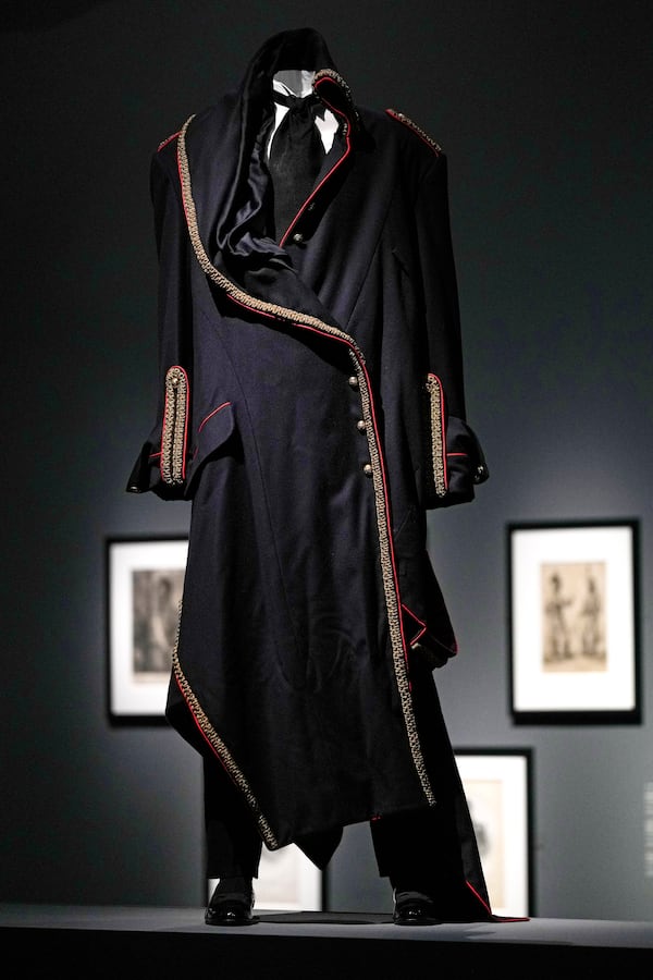 A coat designed by John Galliano for the House of Dior and worn by André Leon Talley is displayed at the Metropolitan Museum of Art's Costume Institute exhibition, "Superfine: Tailoring Black Style," on Saturday, May 3, 2025, in New York. (Photo by Charles Sykes/Invision/AP)