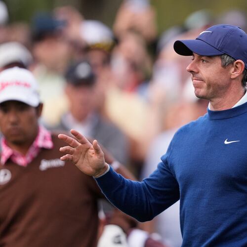 Rory McIlroy of Northern Ireland acknowledges fans appluase before hitting off the 10th tee during the second round of The Players Championship golf tournament Friday, March 13, 2026, in Ponte Vedra Beach, Fla. (AP Photo/Gerald Herbert)