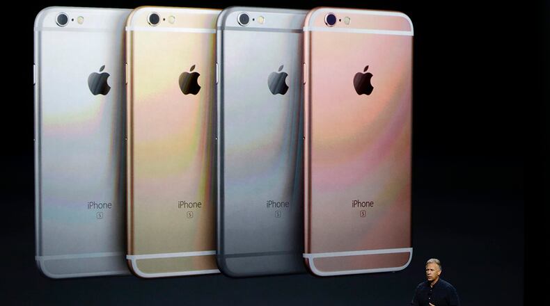 Phil Schiller, Apple's senior vice president of worldwide marketing, talks about the features of the new iPhone 6s and iPhone 6s Plus during the Apple event at the Bill Graham Civic Auditorium in San Francisco, Wednesday, Sept. 9, 2015. (AP Photo/Eric Risberg)