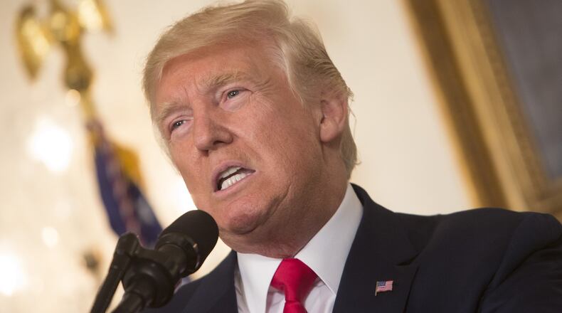President Donald Trump, shown here at the White House speaking Aug. 14 on another topic, said last week that opioid overdose deaths have nearly quadrupled since 1999 but overall drug prosecutions declined in recent years — a trend he vowed to reverse. (Photo by Chris Kleponis-Pool/Getty Images)