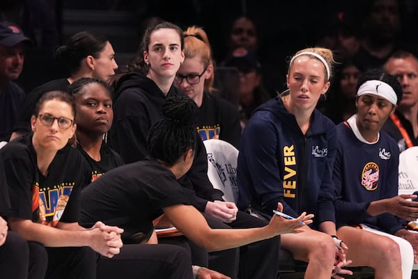 Indiana Fever's Caitlin Clark (center) could be questionable for the WNBA All-Star Game. 