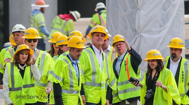 April 12, 2017: Sen. David Perdue and Georgia Department of Transportation Commissioner Russell McMurry toured the I-85 bridge collapse site Wednesday. JOHN SPINK/JSPINK@AJC.COM