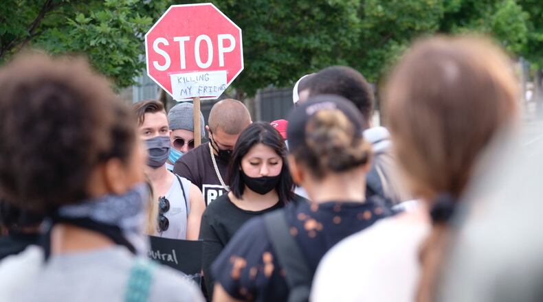 Protesters showed up peacefully around metro Atlanta on Tuesday.