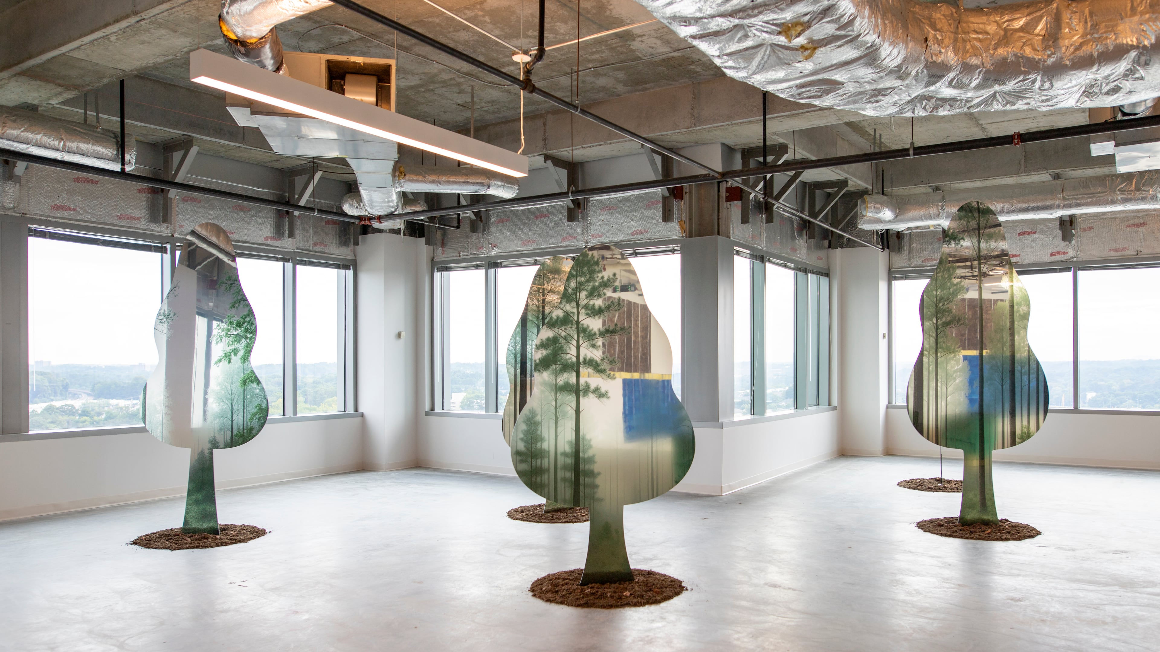 "Synthetic Grove: social ecology 01" by T.W. Pilar offers a mirrored forest on forms ranging from 6.5 to 9 feet high. It's one of the items up for auction at the Hambidge Center. (Isadora Pennington/ArtsATL)
