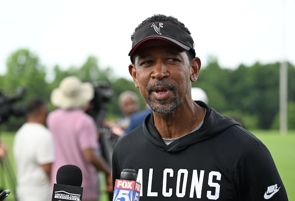 Falcons wide receivers coach Robert Prince speaks to the media on Wednesday, May 27, 2026, in Flowery Branch. Prince has been well-received thus far — and his energy is the driving force. (Hyosub Shin/AJC)