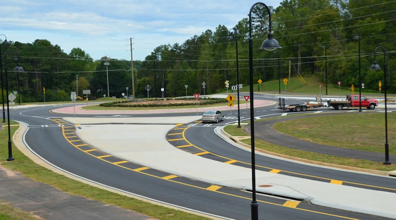 An online survey asks Milton residents if they’d prefer roundabouts, like the one shown here, or traffic signals at the intersections of Hopewell Road with Hamby and Thompson roads. CITY OF MILTON