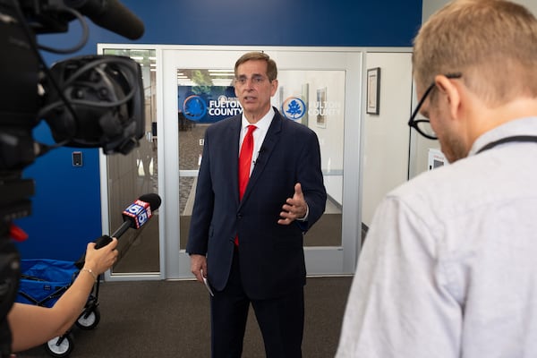 Georgia Secretary of State Brad Raffensperger talks to journalists after visiting the Fulton County elections hub in Fairburn on Tuesday, May 19, 2026. (Ben Gray for the AJC)