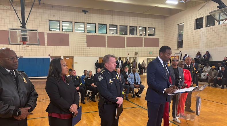 Atlanta Mayor Andre Dickens, alongside Atlanta Police Chief Darin Schierbaum, Fulton County DA Fani Willis and other officials talk about the reduction of crime in 2024 in Atlanta.