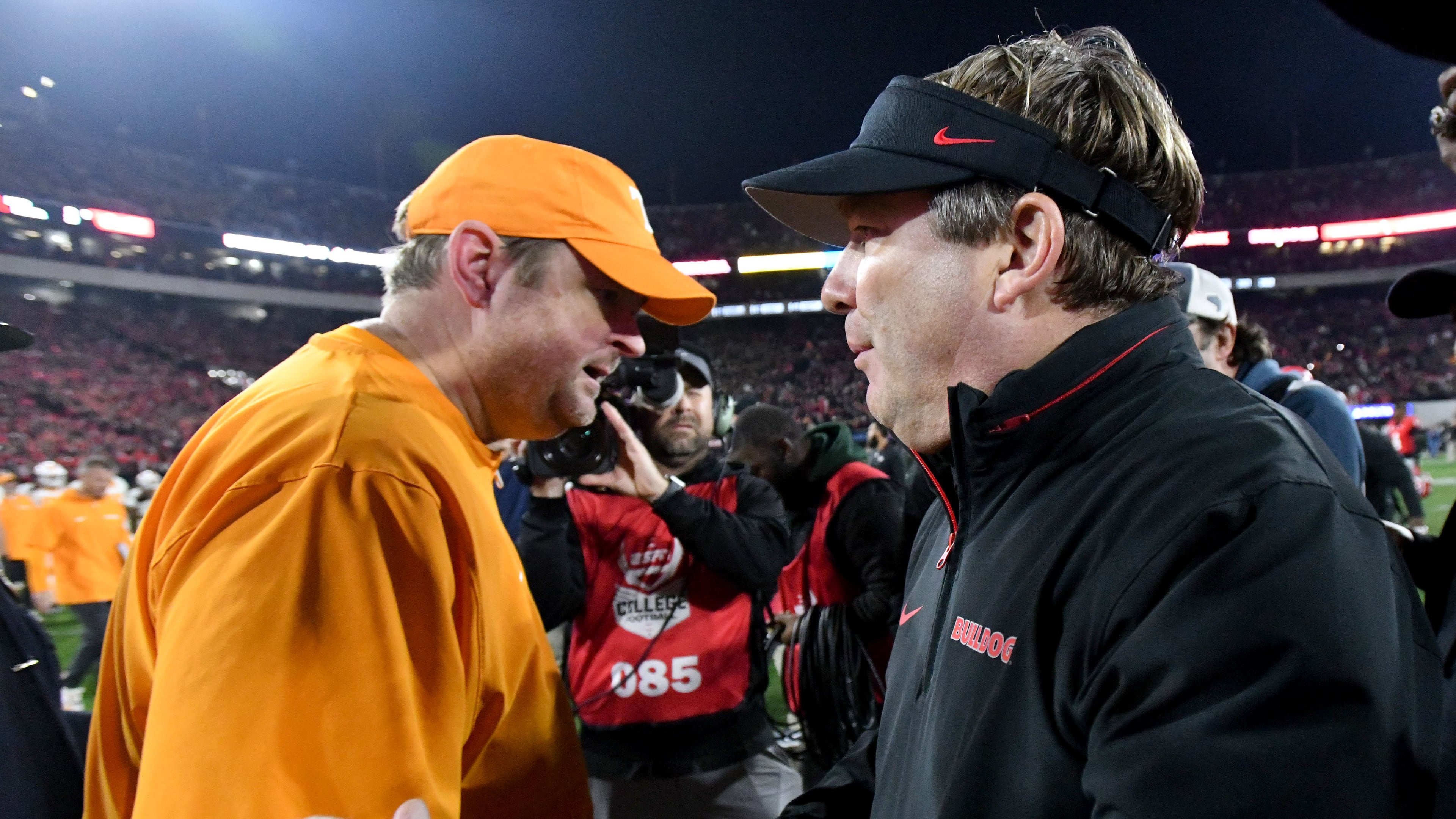 Georgia head coach Kirby Smart and Tennessee head coach Josh Heupel shake hands after Georgia beat Tennessee in an NCAA football game at Sanford Stadium, in Athens. (Hyosub Shin/AJC)