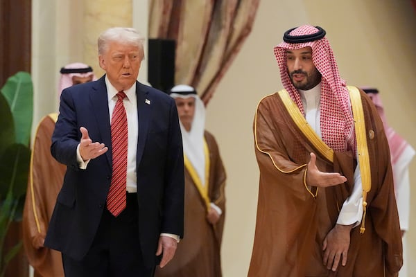 President Donald Trump arrives with Saudi Crown Prince Mohammed bin Salman for the group photo with Gulf Cooperation Council leaders during the GCC Summit in Riyadh, Saudi Arabia, Wednesday, May 14, 2025. (AP Photo/Alex Brandon)