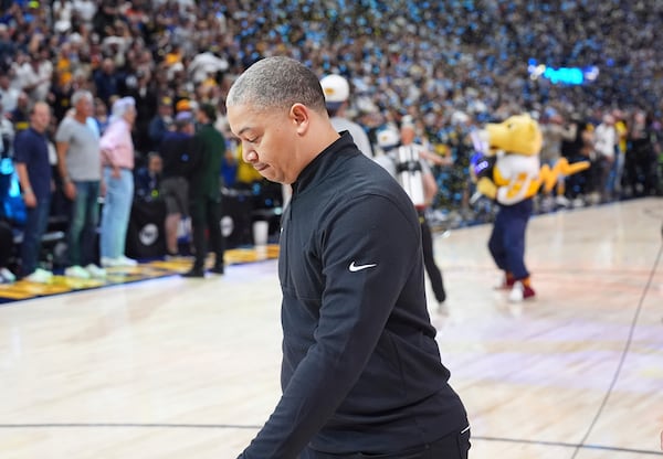 Los Angeles Clippers head coach Tyronn Lue heads off the court after Game 7 of an NBA basketball first-round playoff series against the Denver Nuggets, Saturday, May 3, 2025, in Denver. (AP Photo/David Zalubowski)